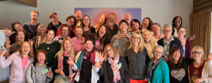 certified meditation teacher and graduates at retreat